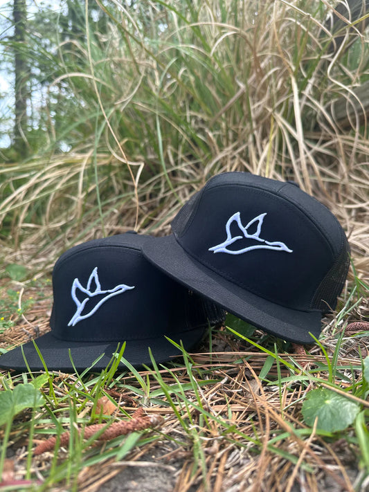 7 Panel Black Hat | White Icon Combat Waterfowl Trucker Hat